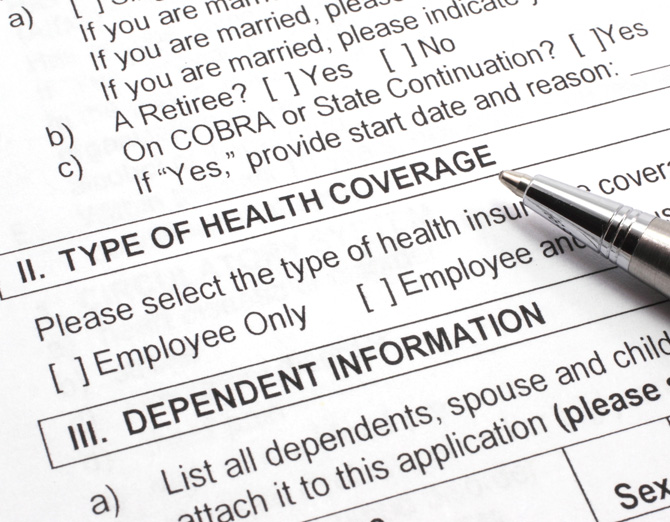 Close-up of health care form with options to select type of coverage